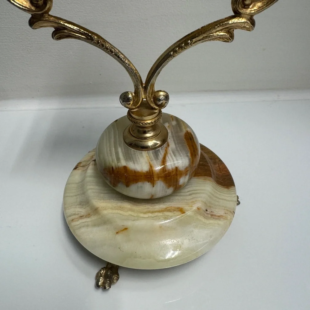 Vintage “Ritz” cherub mantel/desk clock with a brass-tone frame and an onyx